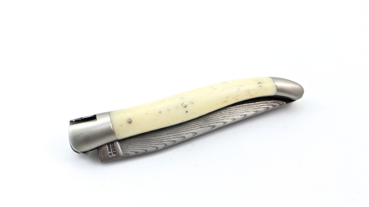 Laguiole en Aubrac jap. Damascusblade bone doubleplates 12 cm