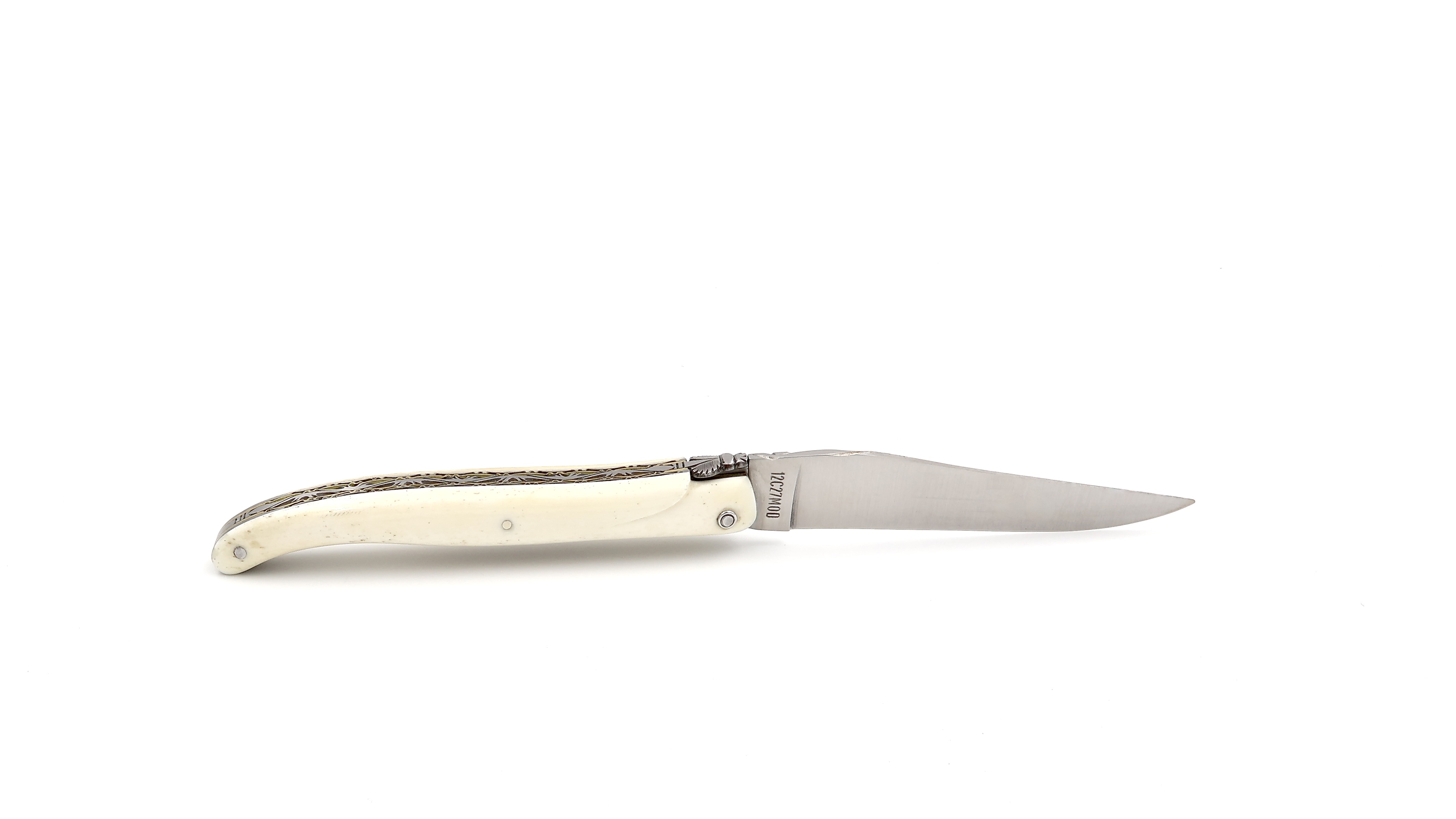 Laguiole en Aubrac double plates knife full handle with brass plates cow bone 12 cm Laguiole en Aubrac double plates knife full handle with brass plates cow bone 12 cm