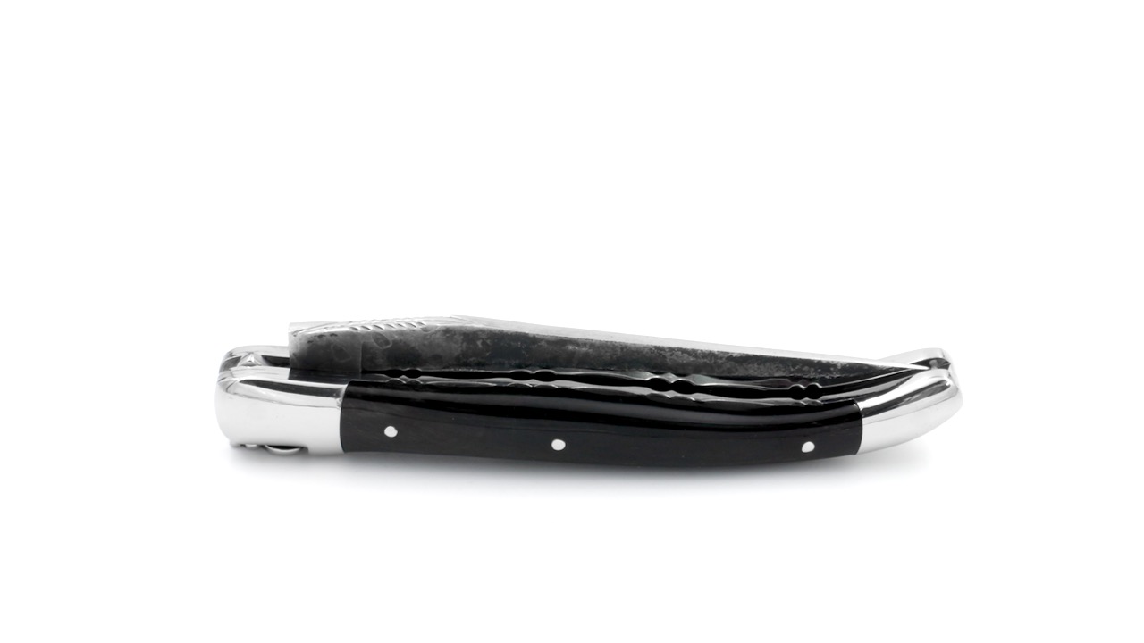 Laguiole en Aubrac double plate knife Brut de Forge buffalo horn 12 cm