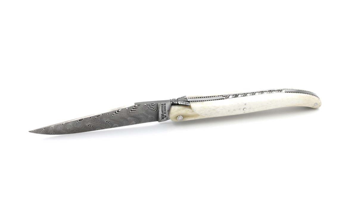Laguiole en Aubrac Modell Perle Damastklinge Aubrac Holz guillochiert massiver Griff 12 cm 