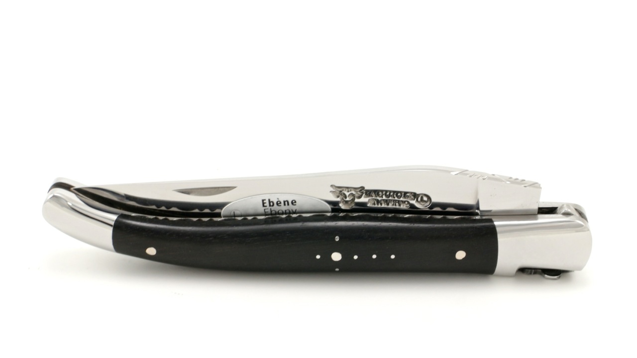 Laguiole en Aubrac ebony Fleur de lis chiseled plates 12 cm