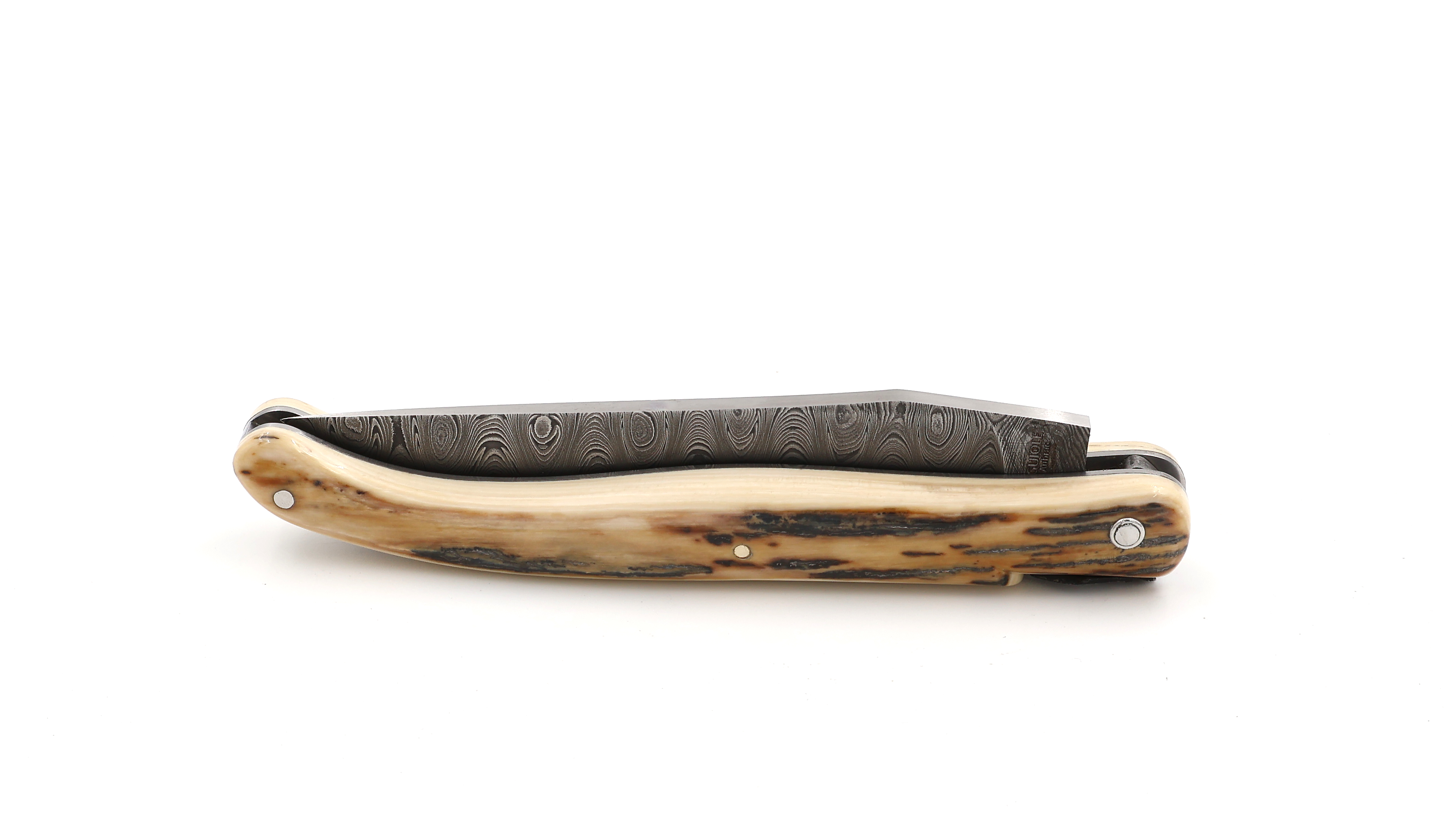 Laguiole en Aubrac Laguiole knife unique piece full handle mammoth ivory twisted damascus blade 12 cm