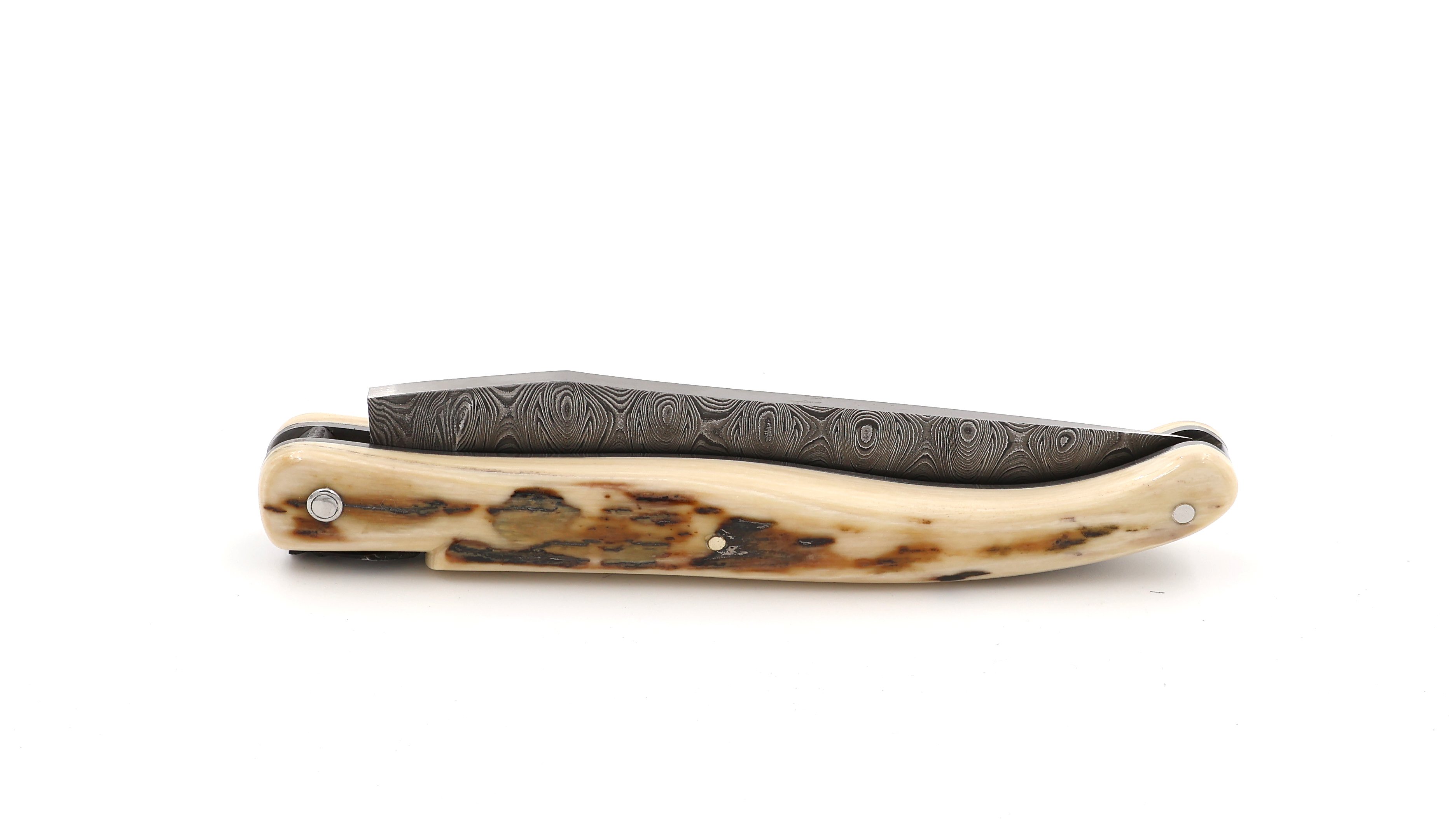 Laguiole en Aubrac Laguiole knife unique piece full handle mammoth ivory twisted damascus blade 12 cm