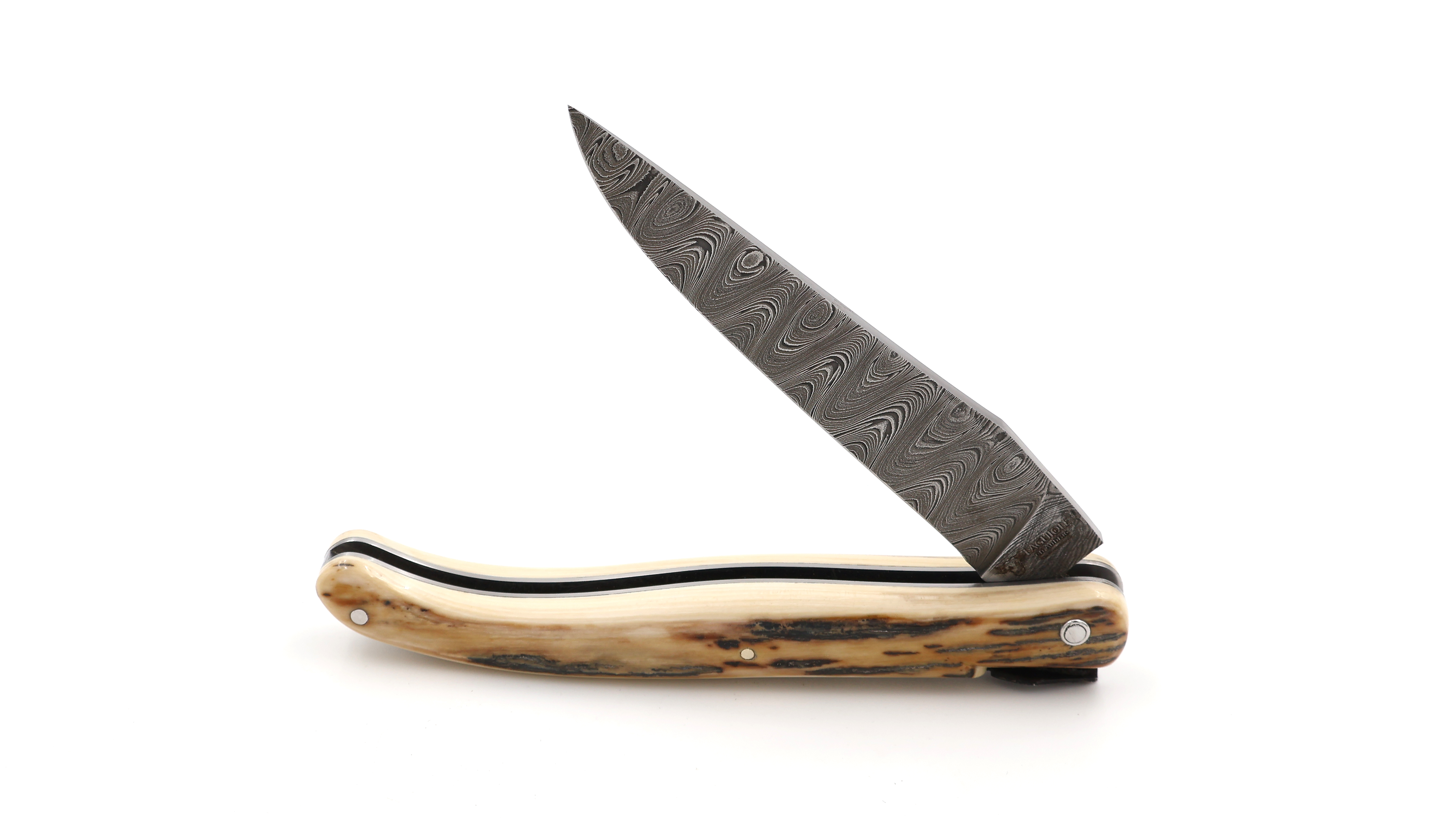 Laguiole en Aubrac Laguiole knife unique piece full handle mammoth ivory twisted damascus blade 12 cm