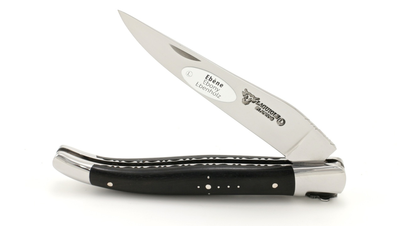 Laguiole en Aubrac ebony Fleur de lis chiseled plates 12 cm