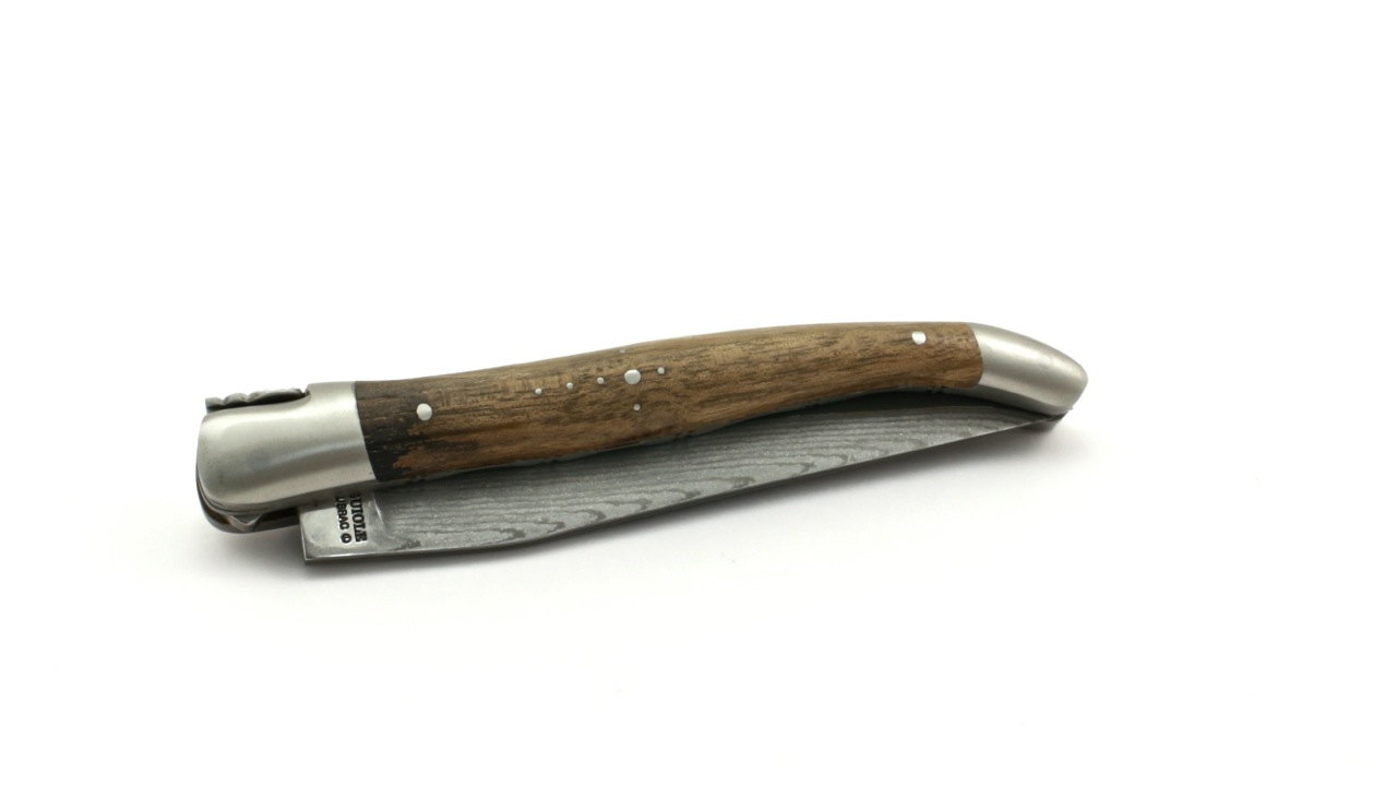 Laguiole en Aubrac double plate knife jap. damascus Walnut root wood 12 cm