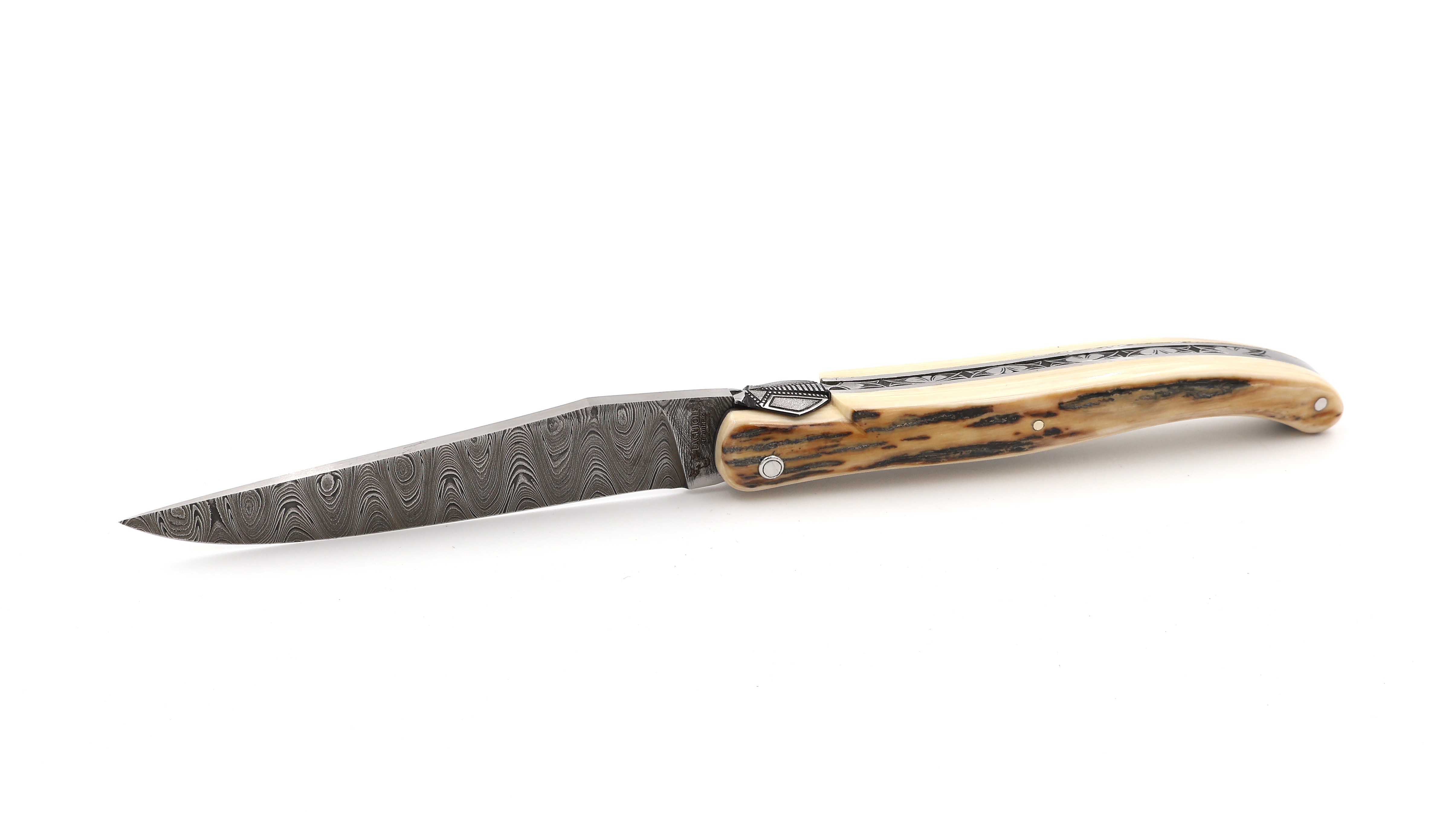 Laguiole en Aubrac Laguiole knife unique piece full handle mammoth ivory twisted damascus blade 12 cm