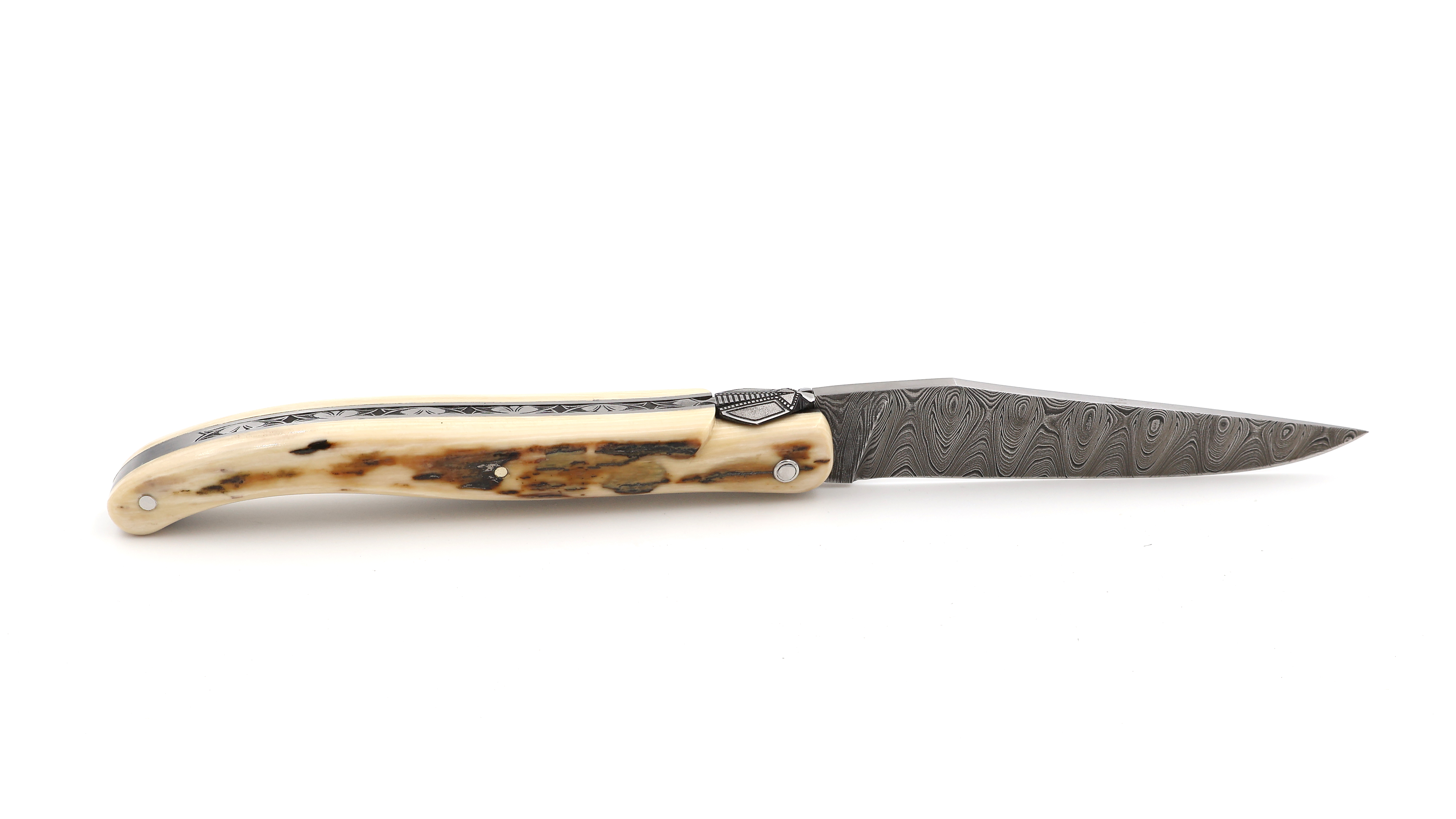 Laguiole en Aubrac Laguiole knife unique piece full handle mammoth ivory twisted damascus blade 12 cm