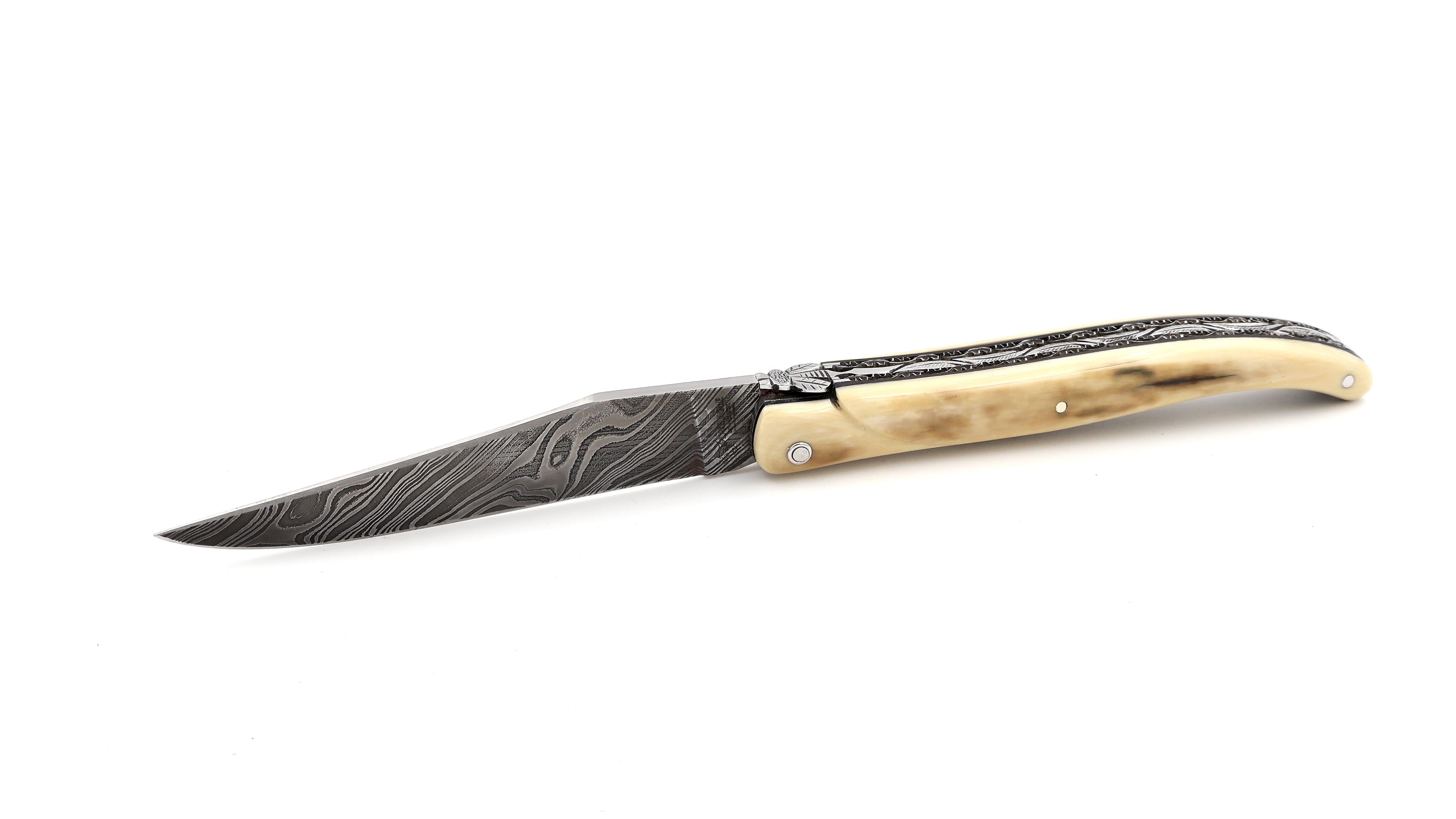 Laguiole en Aubrac Twisted-Damast Mammutelfenbein Kruste massiv Doppelplatinen 12 cm